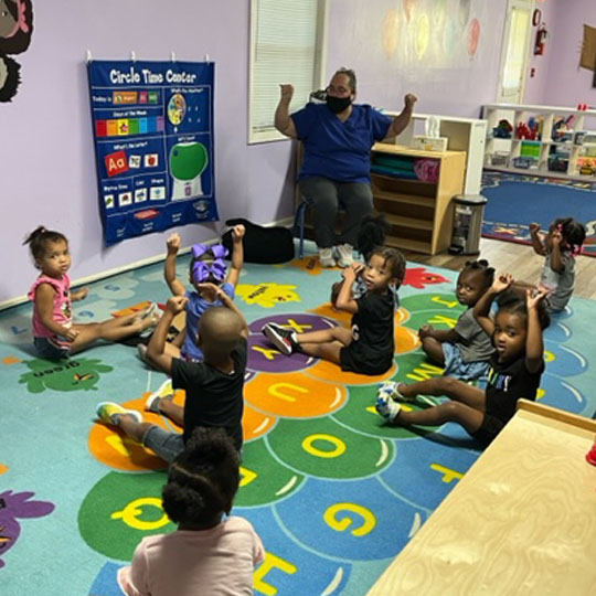 Children singing.